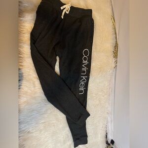 Calvin Klein SIZE SM black jogger w/ name up one leg
